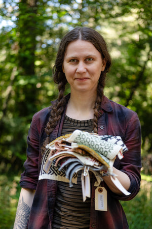 Andrea Rangel with Colourwork Swatches