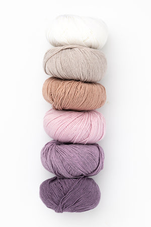 Happy Baby Blanket in Drops Baby Merino wool flower patch colourway