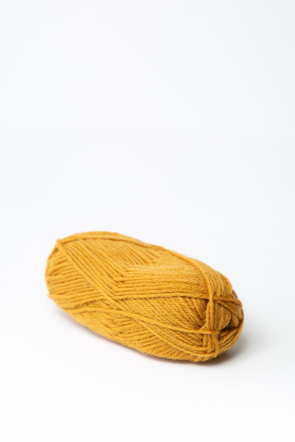 Drops Karisma wool 52 dark mustard uni