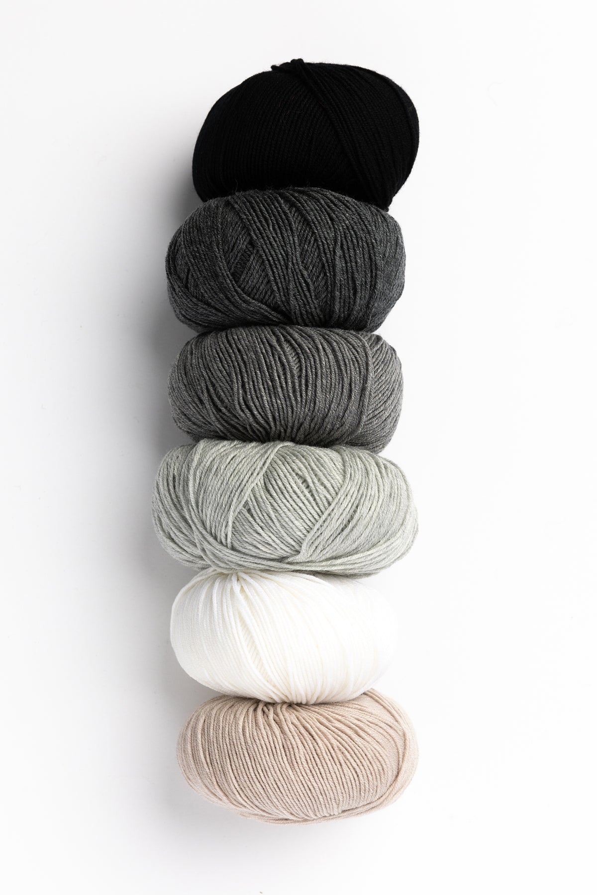 Happy Baby Blanket in Baby Merino and Tynn Merinoull wool cumulus colourway