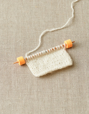 Cocoknits Stitch Stoppers eva foam in use on dpn's